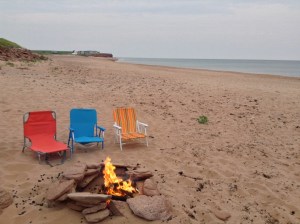 Beach and fire pit at Beach House at Cousin's Shore